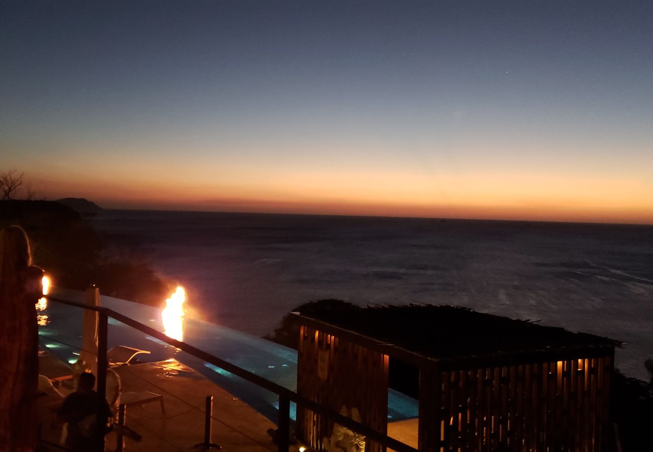 Condominium in Las Catalinas - Beach Club Included | 1 min to beach | sleeps 5 | Plaza Mercado 12